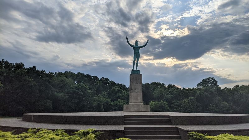 The Sun Singer Statue: A Towering Masterpiece in the Woods