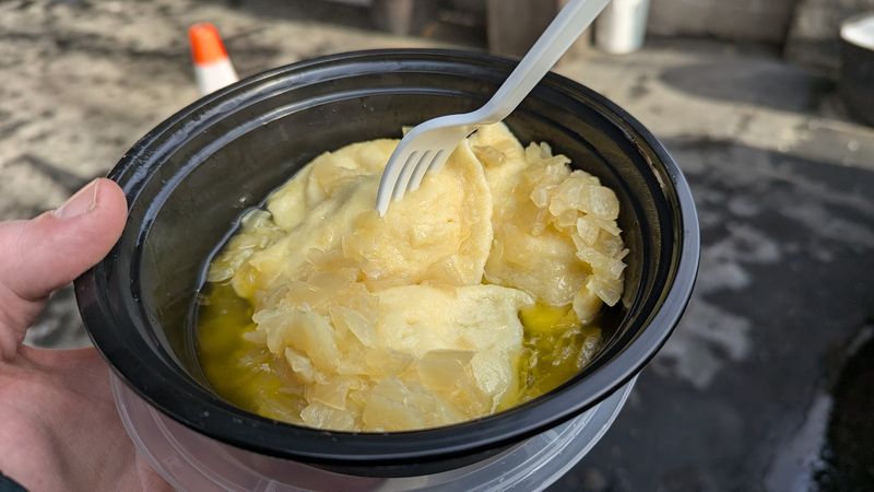 The Signature Potato & Cheese: Swimming in Buttery Onion Heaven