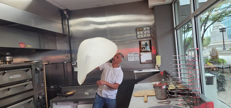 The Hand-Tossed Dough Made Fresh Daily