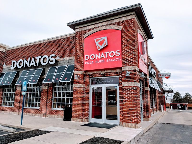 Brick-and-Stone Facades Inspired by Early 1900s Architecture