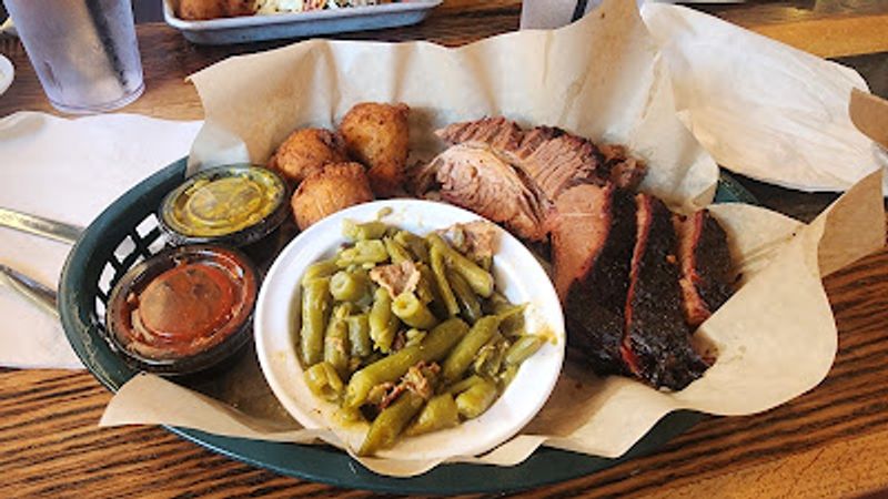 The Hardwood Smoke That Reaches You Before the Menu Does
