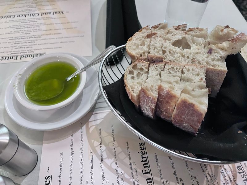 Irresistible Warm Bread and Herbed Olive Oil