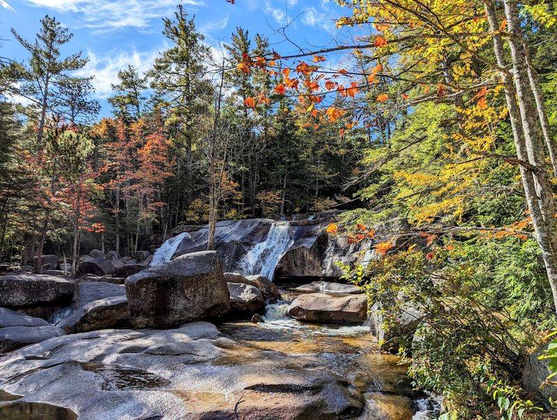 Autumn Foliage Frames Cascading Waters
