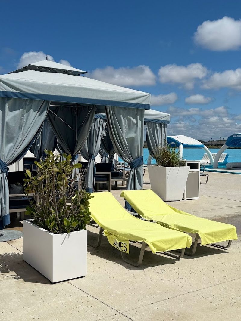 Relaxing in Private Cabanas and Beach Loungers