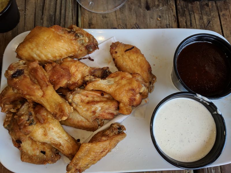 8. Wings, Fried Pickles, and Game-Day Noise