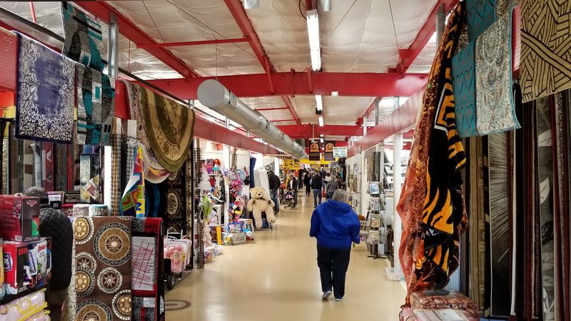 Big space, busy aisles, and weekend curiosity at Treasure Aisles Flea Market, Monroe