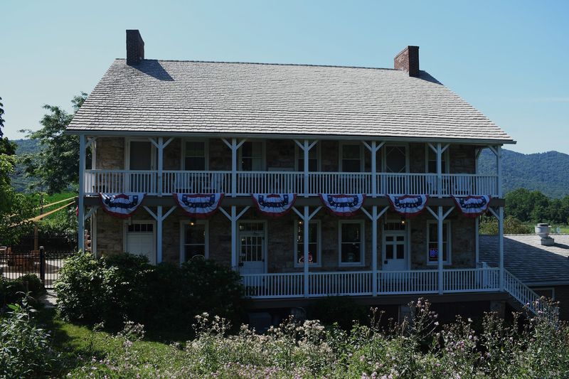 Porch Seating And Goats Bring Extra Charm