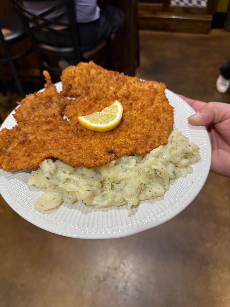 A Schnitzel That Takes Over the Plate