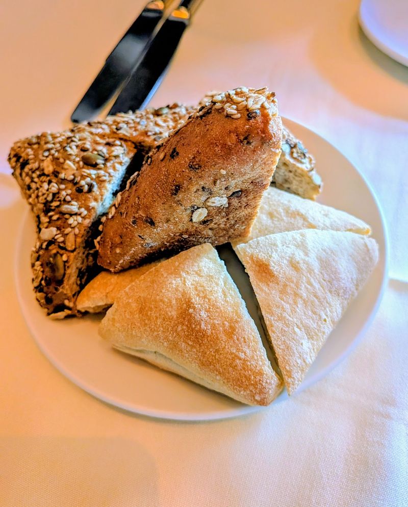 Bread, Garlic, and Tiny Surprises Start the Evening Right
