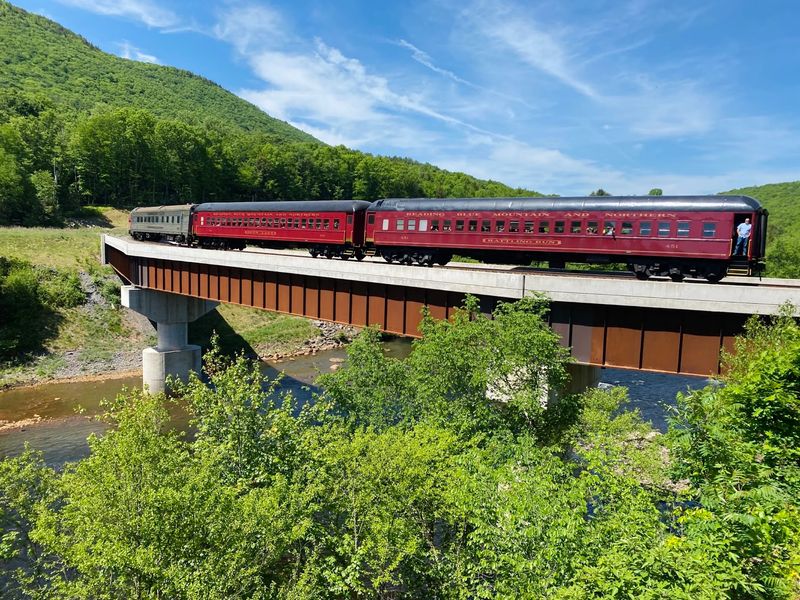 The Train Follows the Lehigh River Into Mountain Country