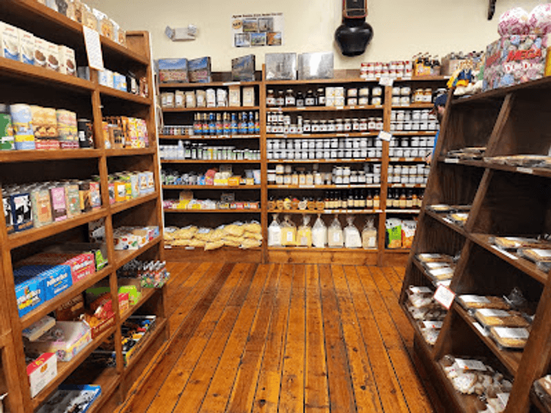 Shelves Filled With Jams, Honey, Meats, and Country Treats