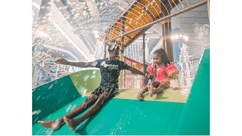 Race Down Slides and Explore the Water Attractions