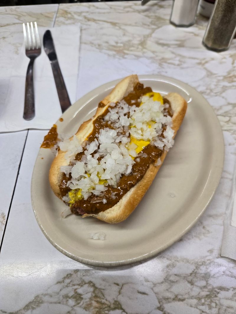 The Chili, Mustard, and Onion Combination Is the Whole Point