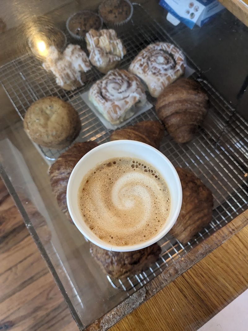 Pumpkin Pie Latte + Pumpkin Cream Cheese Muffin at Omie's Coffee Shop & Roastery, Durham