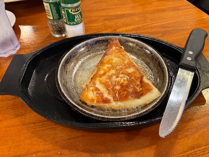 Saganaki Brings A Little Drama To The Table