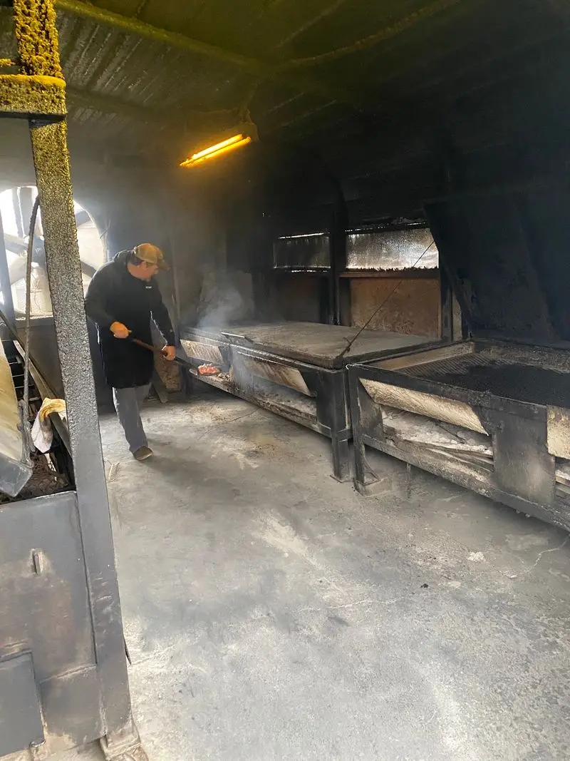 Whole Hogs Cook Low And Slow Over Wood