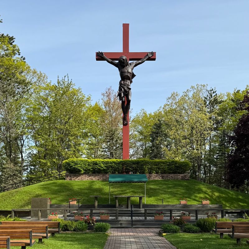 A Giant Crucifix Rising From The Pines