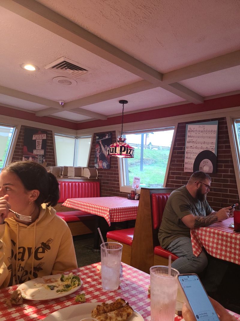 Red-Checkered Tables And Vinyl Booths Make It Feel Authentic