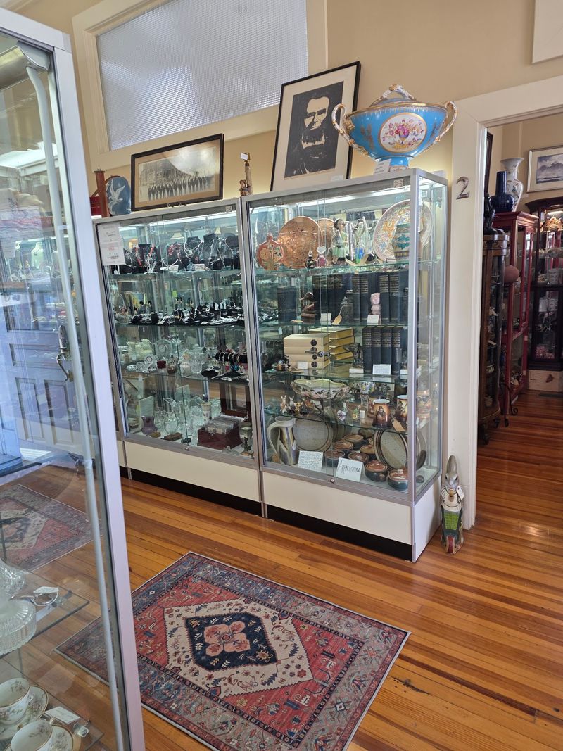 Jewelry And Small Collectibles Fill The Front-Hall Showcases
