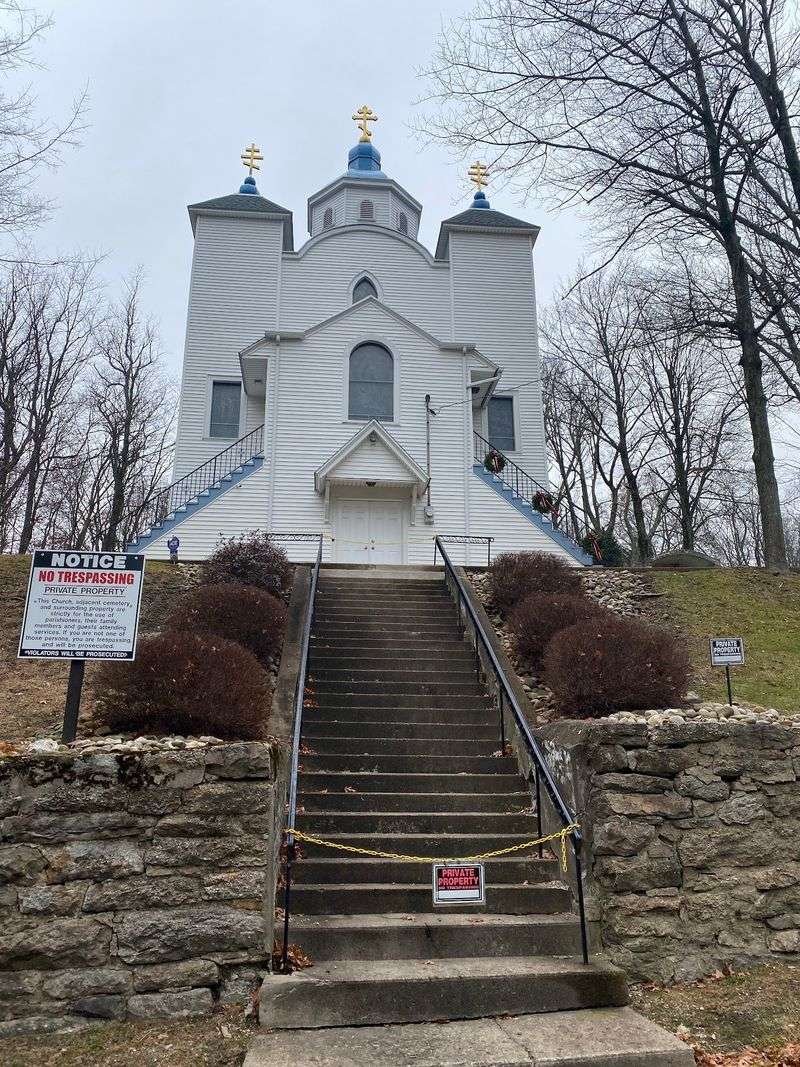 A Church And Cemeteries Still Stand Their Ground