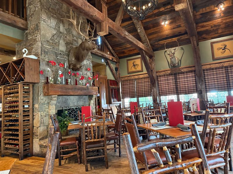 Grab A Table Near The Stone Fireplace If You Can
