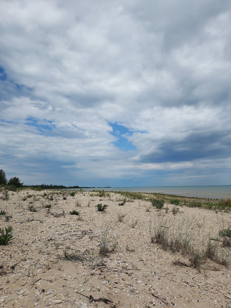 A Sandy Finger Of Land Points Straight At A Shipwreck Zone