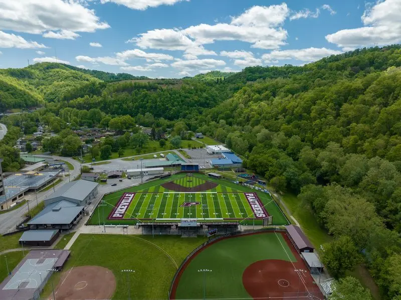 A Hilltop Campus Where Bears Roam The Sidelines