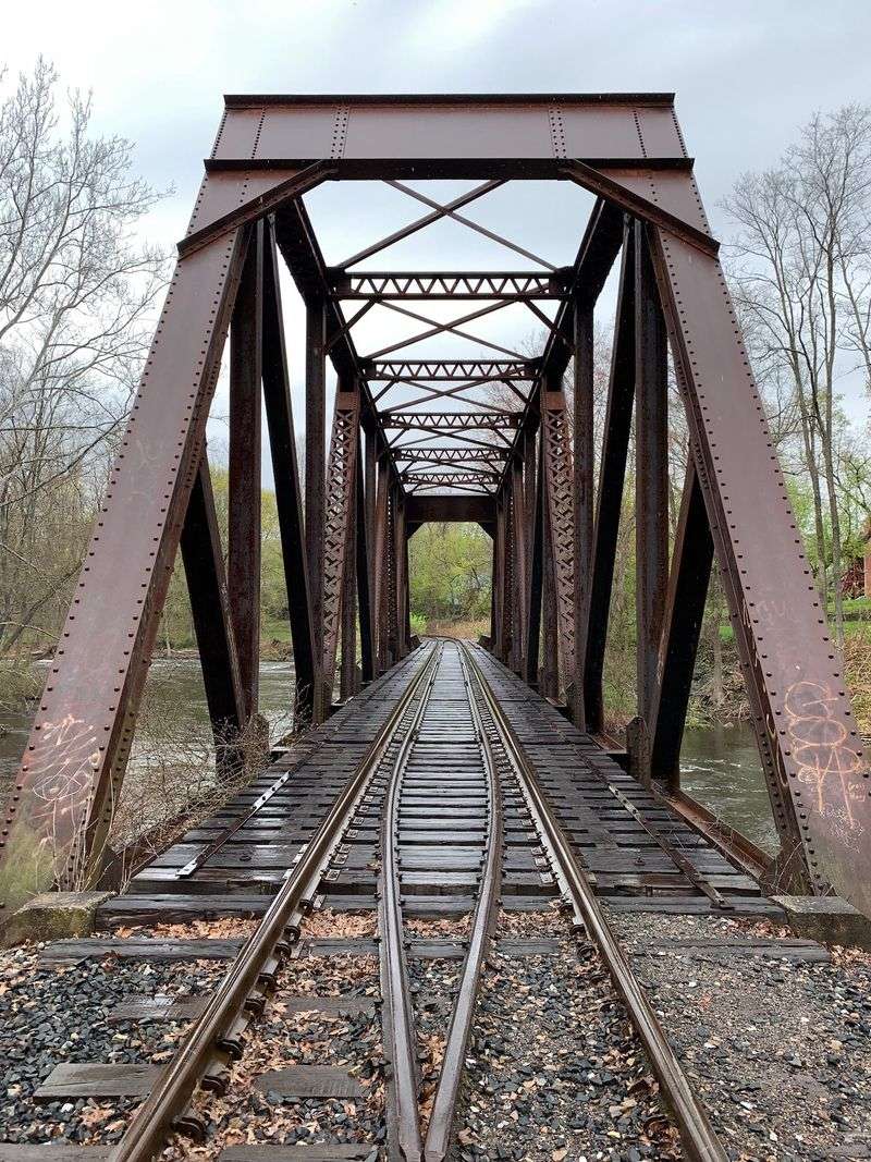 That Iron Bridge Gives You A Front-Row Seat To Rushing Water
