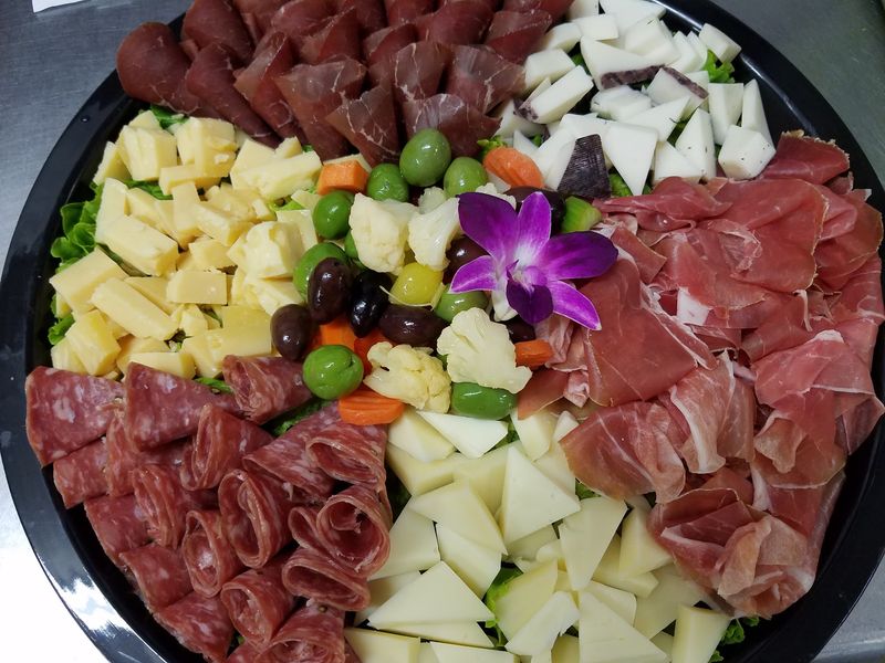 Imported Cheeses And Fancy Meats Sold By The Weight