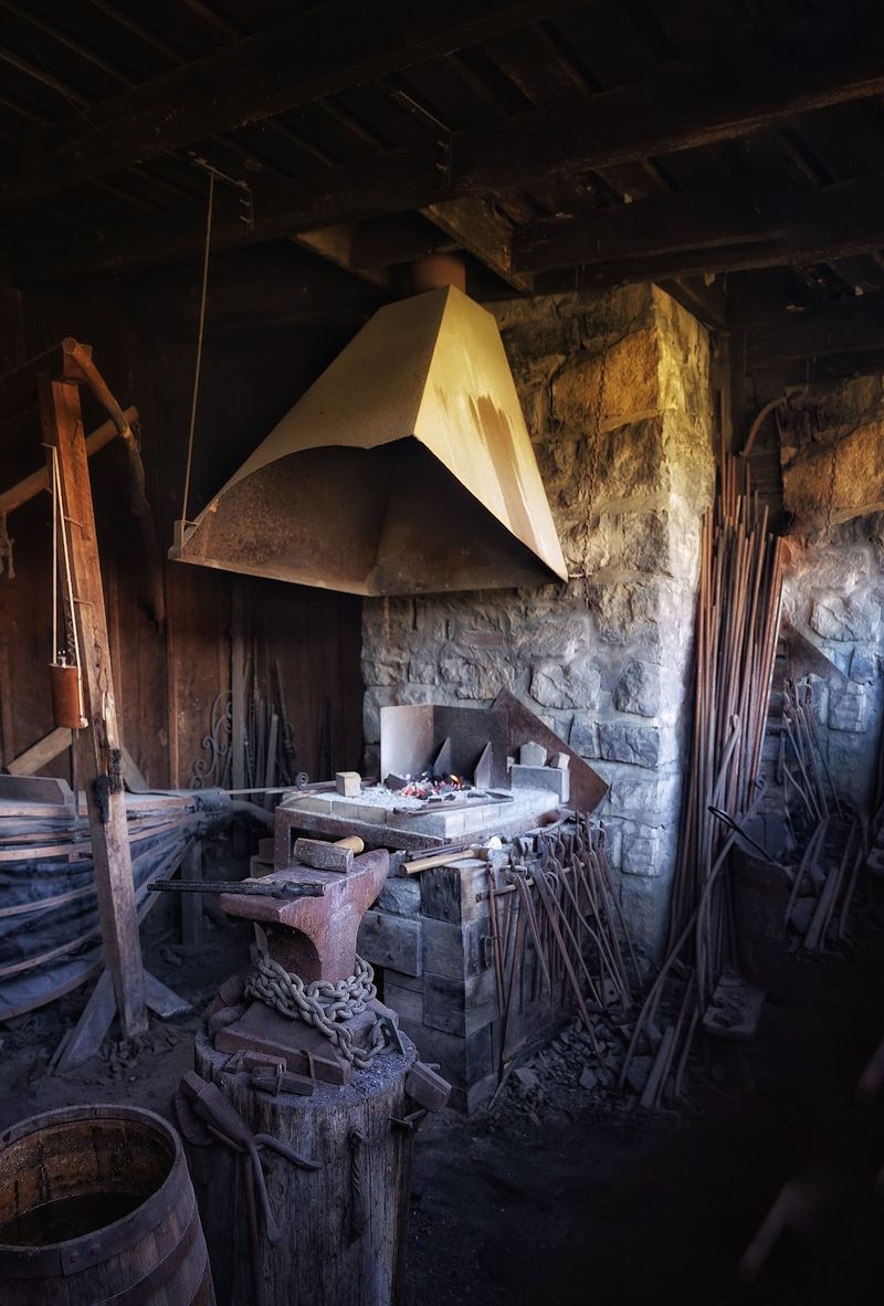 Blacksmith Sparks, Musket Smoke, And Frontier Cooking