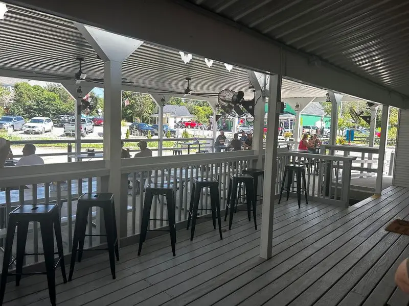 Grab A Seat Outside Under The Covered Patio