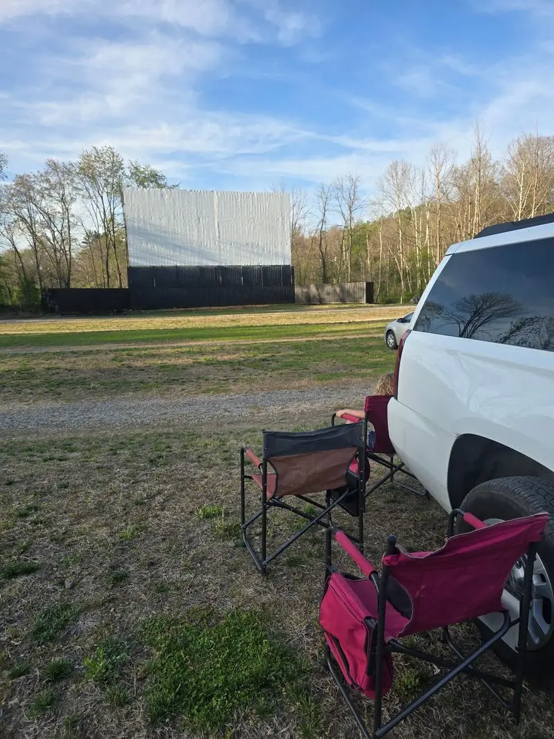 Two Hundred Cars Facing One Giant Screen