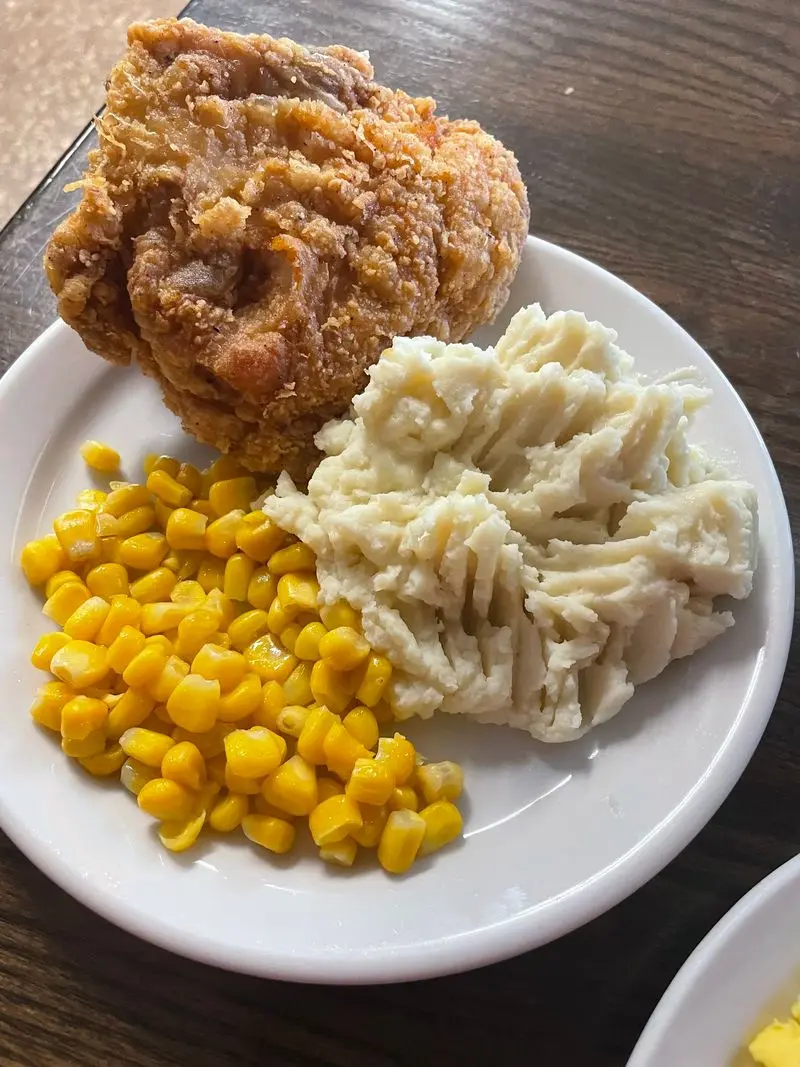 The Fried Chicken Is Why The Parking Lot Fills Before Opening