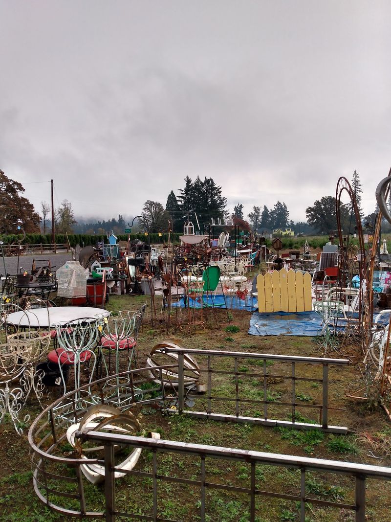 A Front Yard Full of Garden Art and Iron