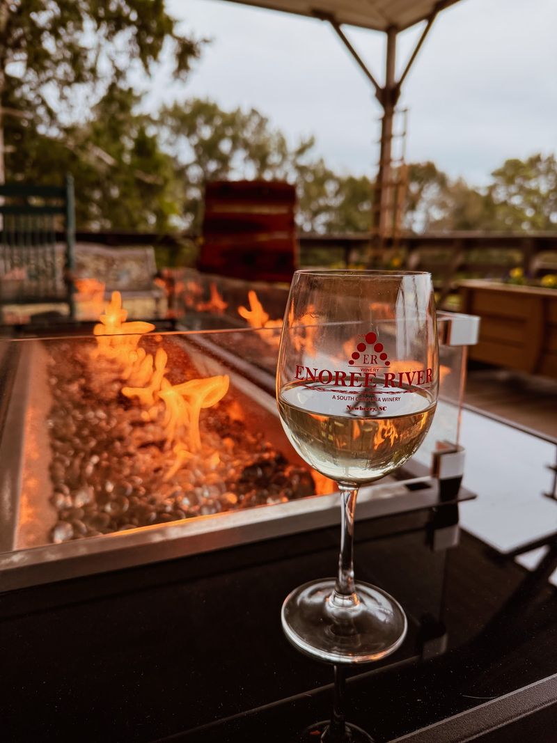 A Fireplace And Barrel Tables Make The Tasting Room Feel Like A Hug