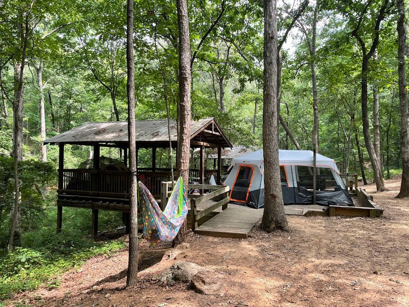 Your Tent Gets A Fancy Wooden Stage Up Here