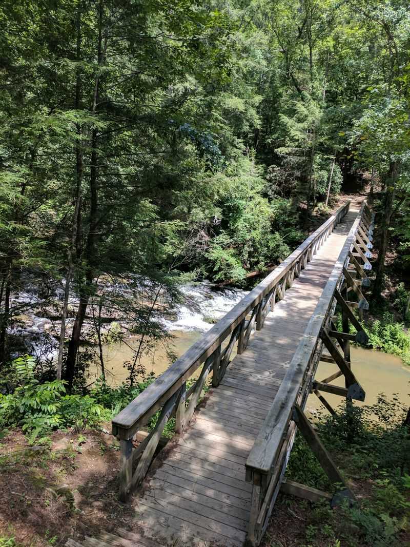 A Wooden Bridge Gives You A Bird's-Eye Seat Above The Rapids