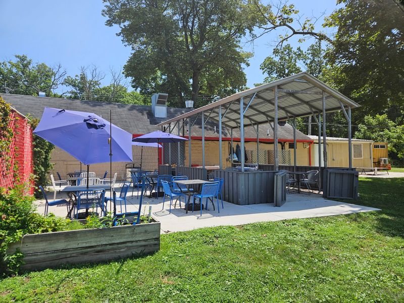 The Patio Is Where Dogs, Kids, And Cornhole Win