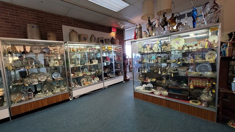 Small Treasures Hide In Glass Cases And Shelves