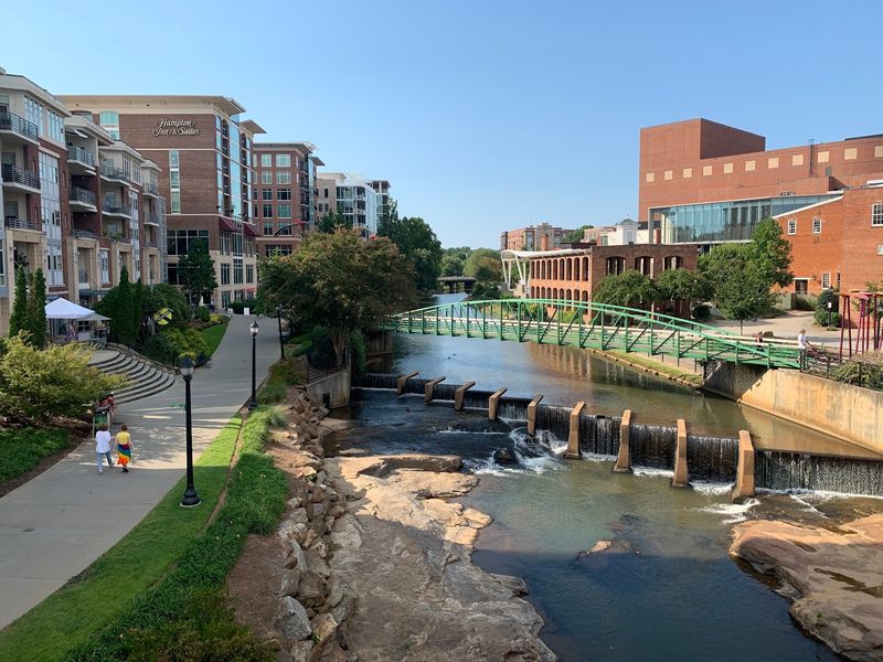 Pedal Your Way Out Of Town On A Riverside Trail
