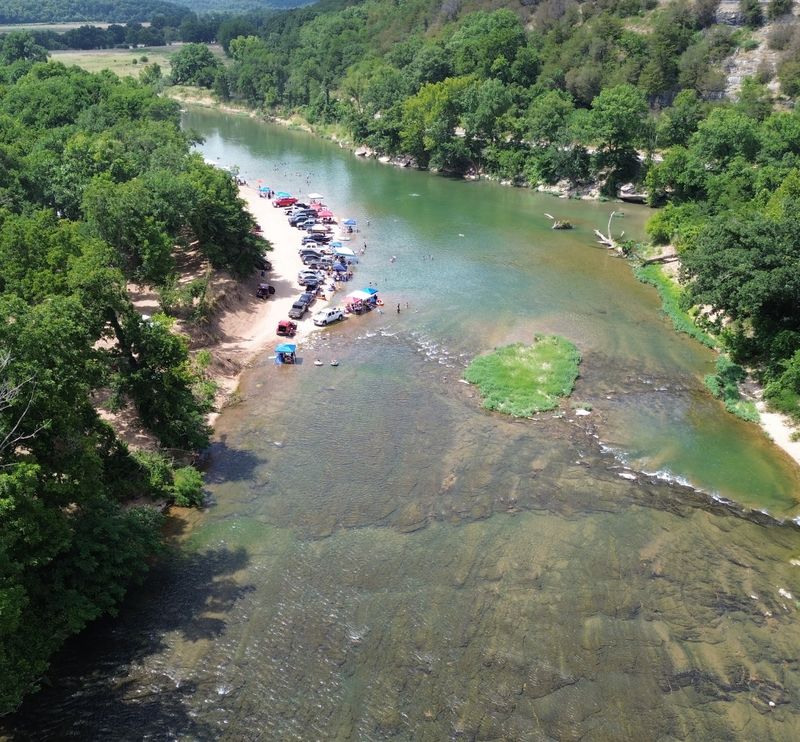 A Riverside Dot Hugging The Arkansas Line