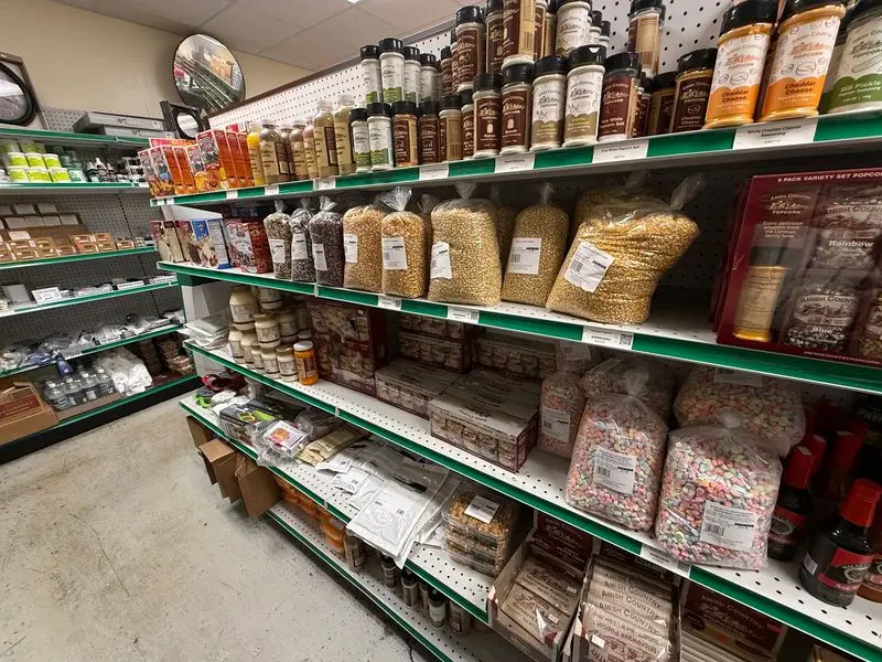 An Aisle Full Of Spices, Flours, And Cornmeal