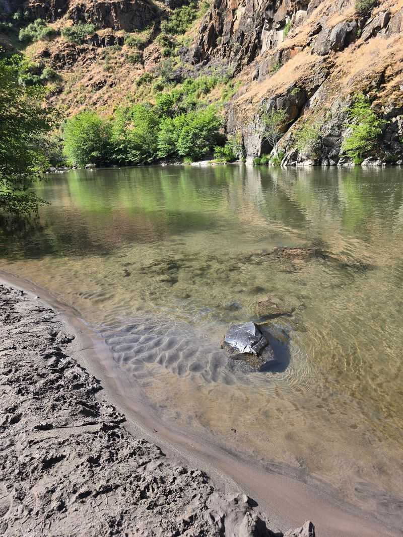 A Chilly Swimming Hole With A Little Beach