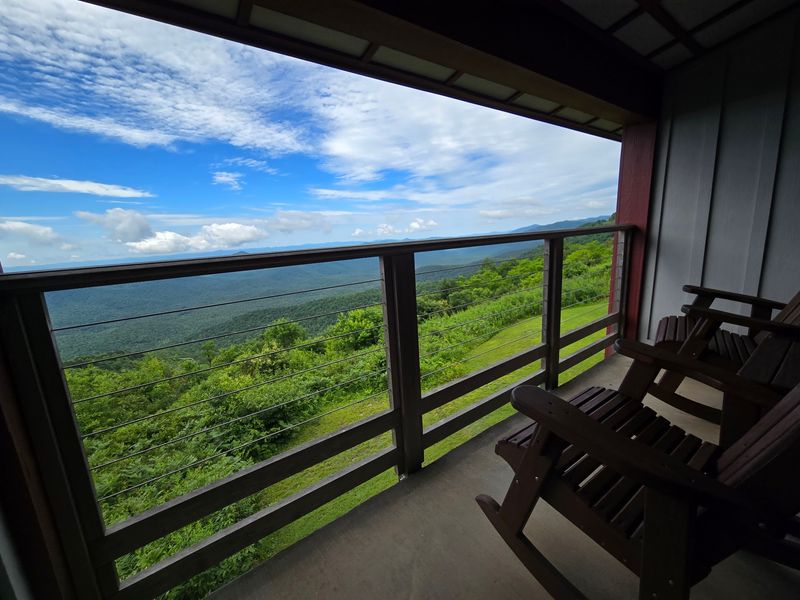 Every Room Comes With A Rocking Chair And A Mountain Show