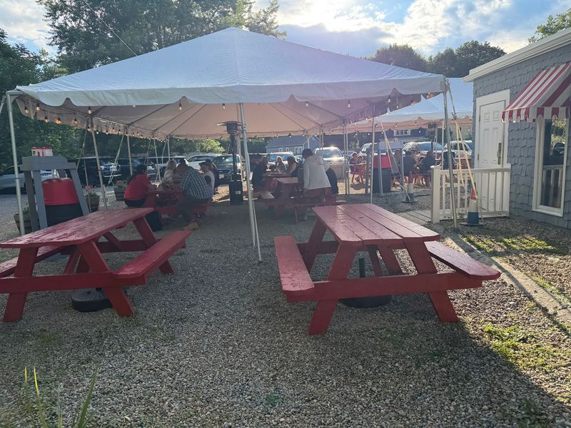Grab A Picnic Table Under The Big Tent When The Weather Cooperates