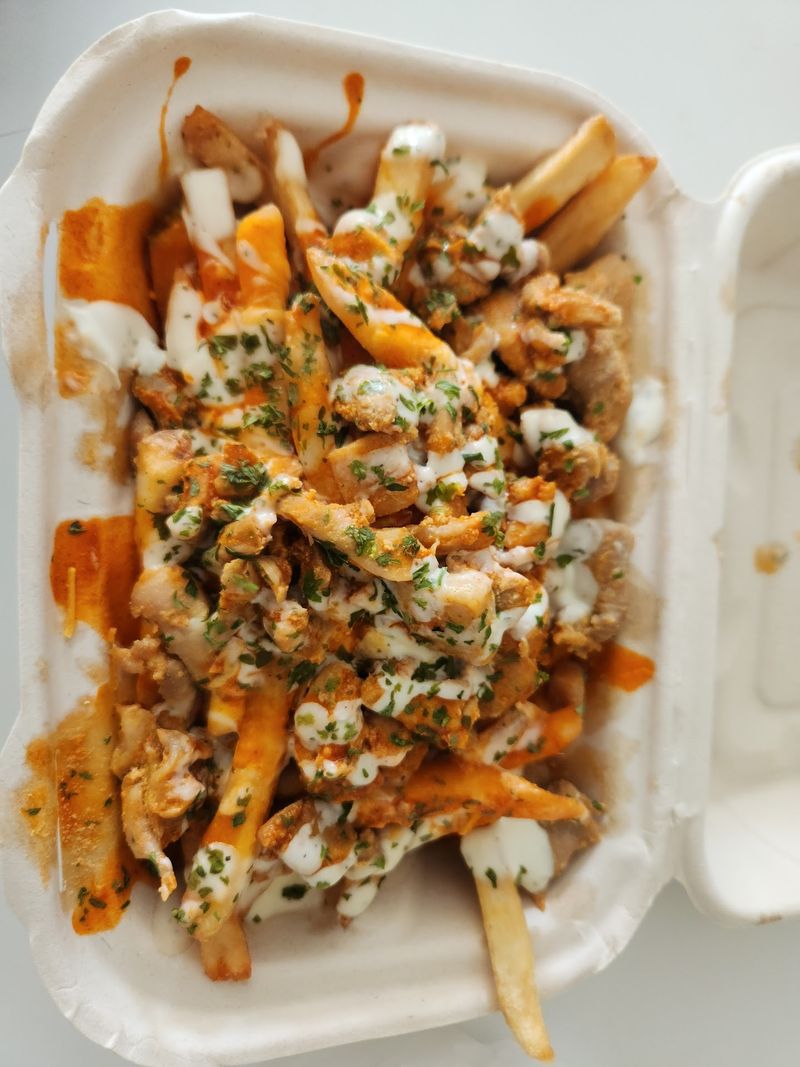The Fries Get Top Billing, And The Toppings Know It