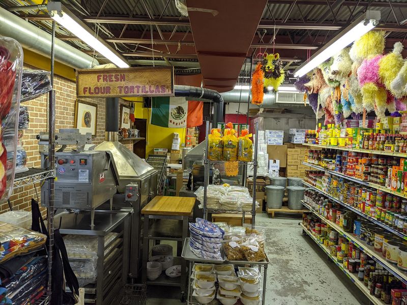 Tortillas Come Off The Line Fresh And Dried Peppers Fill The Shelves