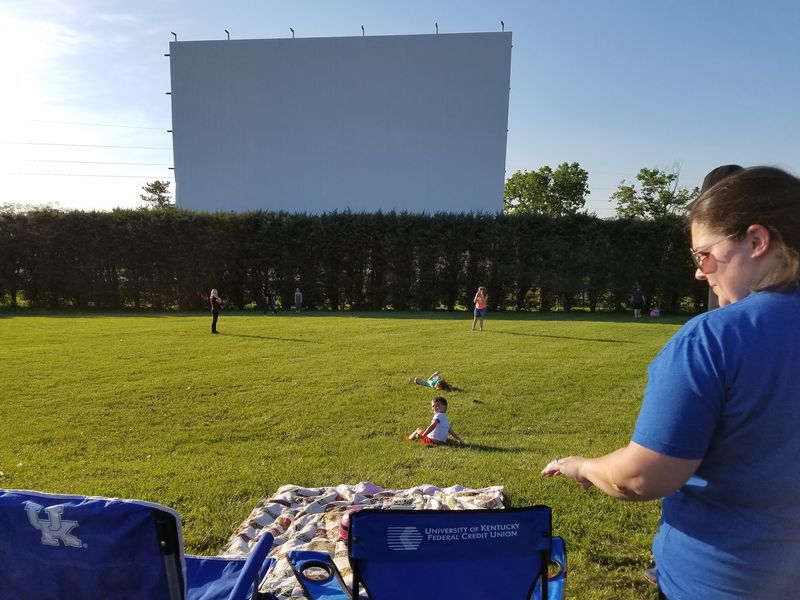 Kids on the Grass and Grown-Ups in Lawn Chairs