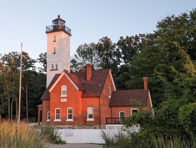 A Red-Roofed Lighthouse Steals Every Photo