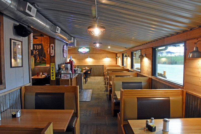 Cushioned Booths, Soft Music, And An Upstairs Lounge Worth A Peek